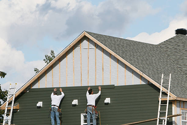 Professional Storm Damage Siding Repair technician working in Church Hill, PA